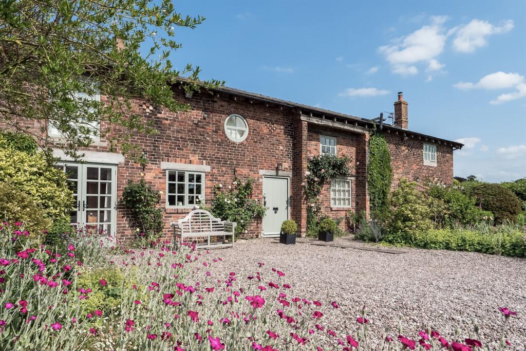 Main image of property: Mill Lane, Alderley Edge