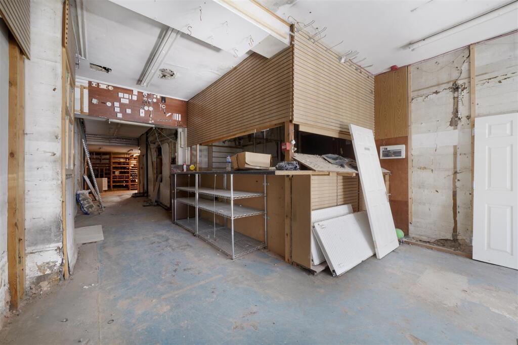Front of house with shop front