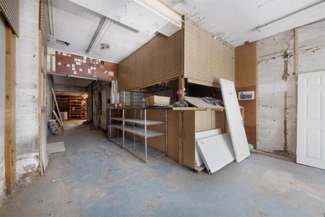 Front of house with shop front