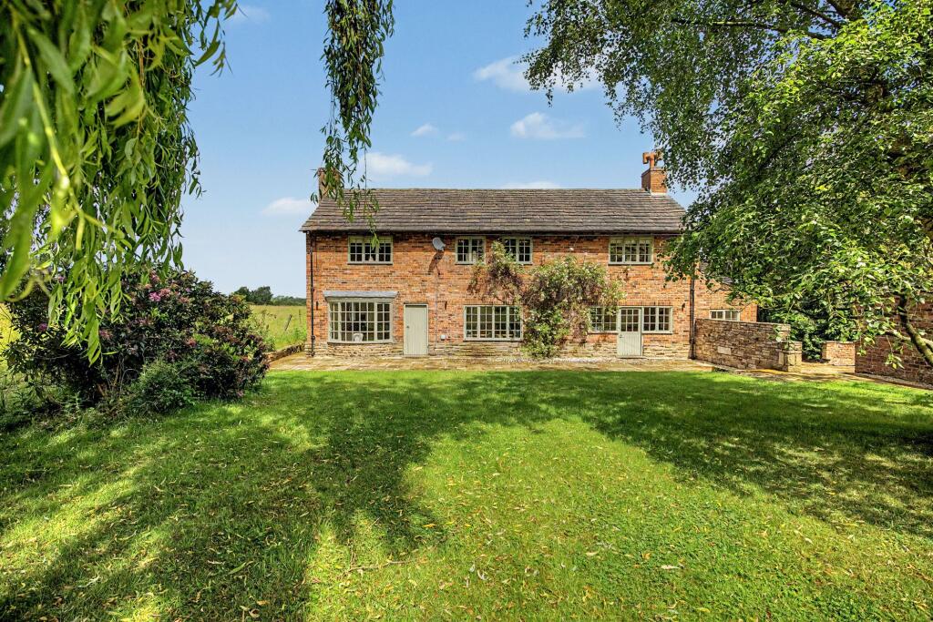 Main image of property: The Barn House, Wilmslow Road, Prestbury, Macclesfield, SK10 4LG