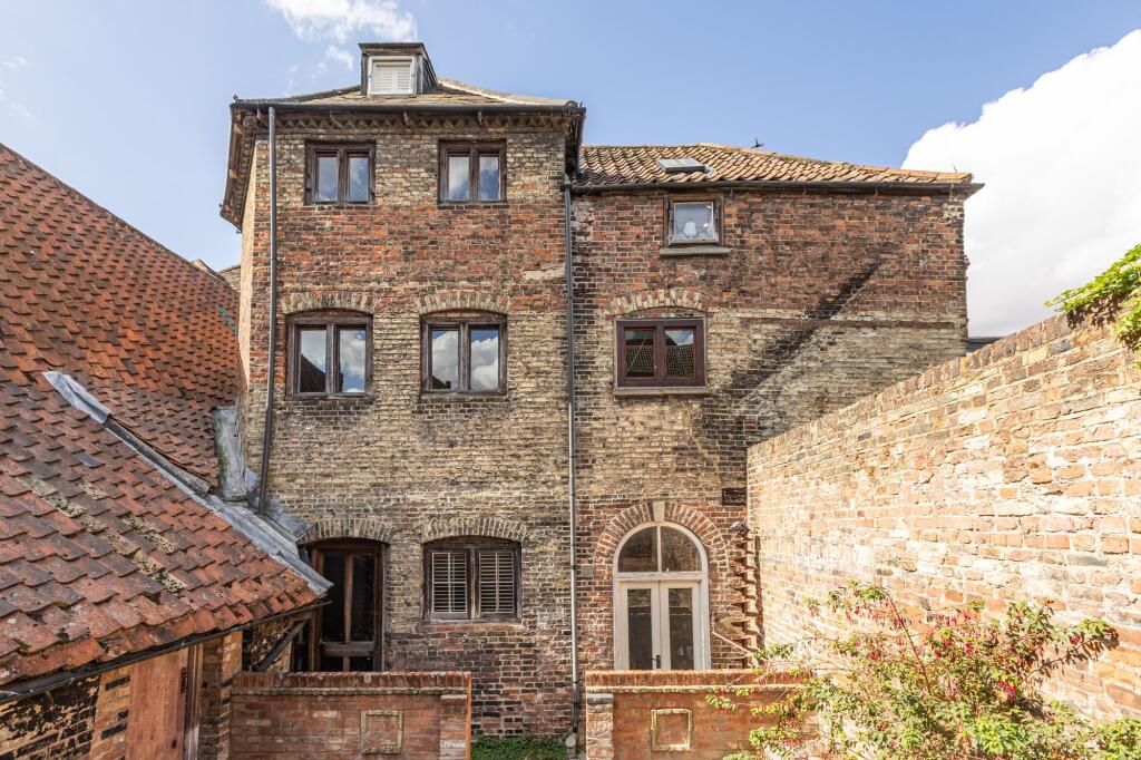 Main image of property: Striking, Historic Riverside Home in King's Lynn