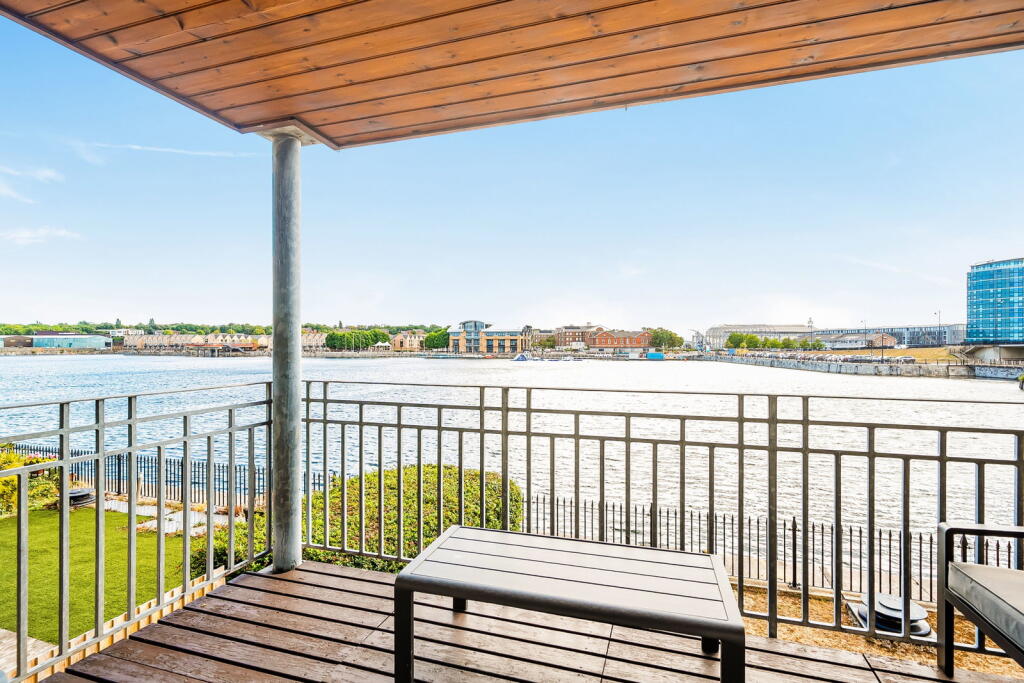 Main image of property: Exceptional Two Bedroom Waterfront Apartment | Balcony | Marina Views | Two Parking Spaces