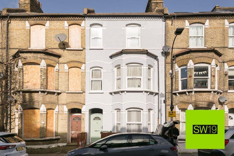 Main image of property: **Stunning Four-Story Period Townhouse in Prestigious Fulham Location**