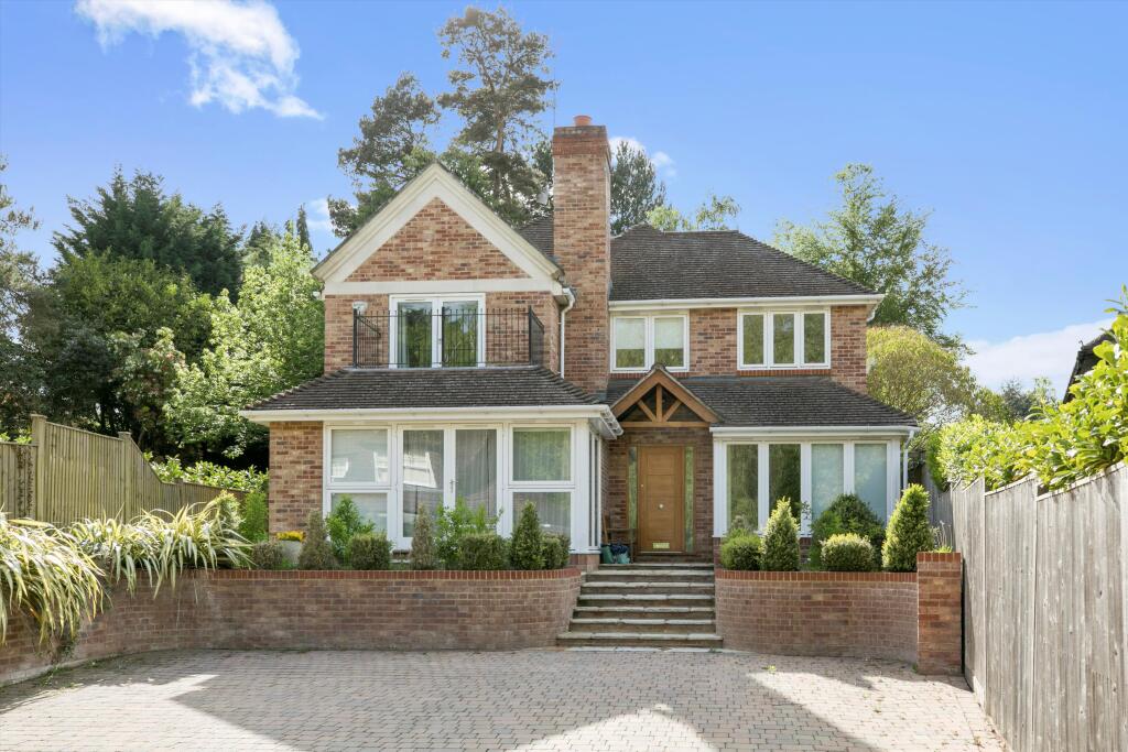 Main image of property: Roundhill Way, Cobham, Surrey, KT11