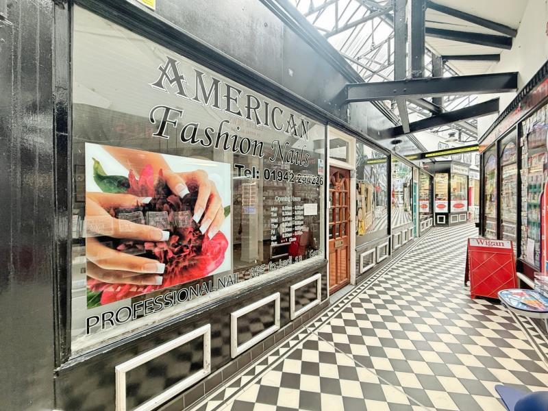 Main image of property: Unit 2, Royal Arcade, Standishgate, Wigan WN1 1QH