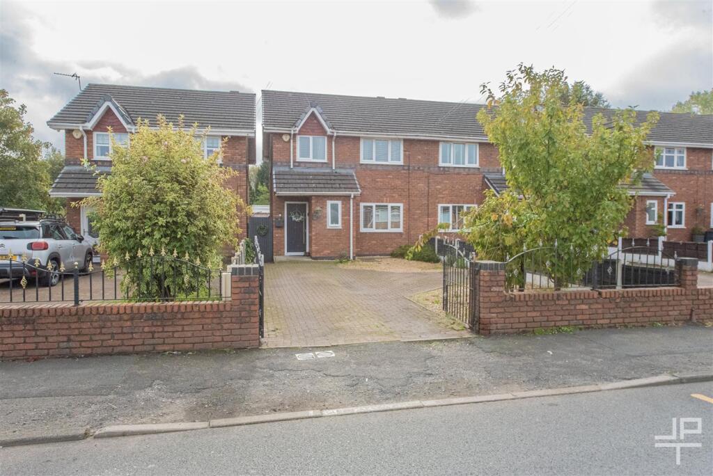 Main image of property: Lily Lane, Bamfurlong, Wigan, WN2 5JW