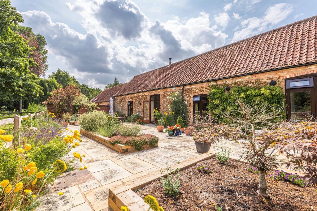 Main image of property: Barn Conversion in Middleton with Impressive Vaulted Ceilings