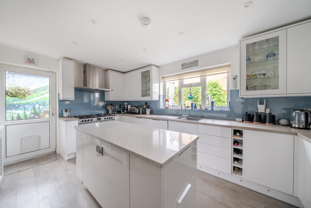 Main image of property: High Tree Close, Row Town, KT15