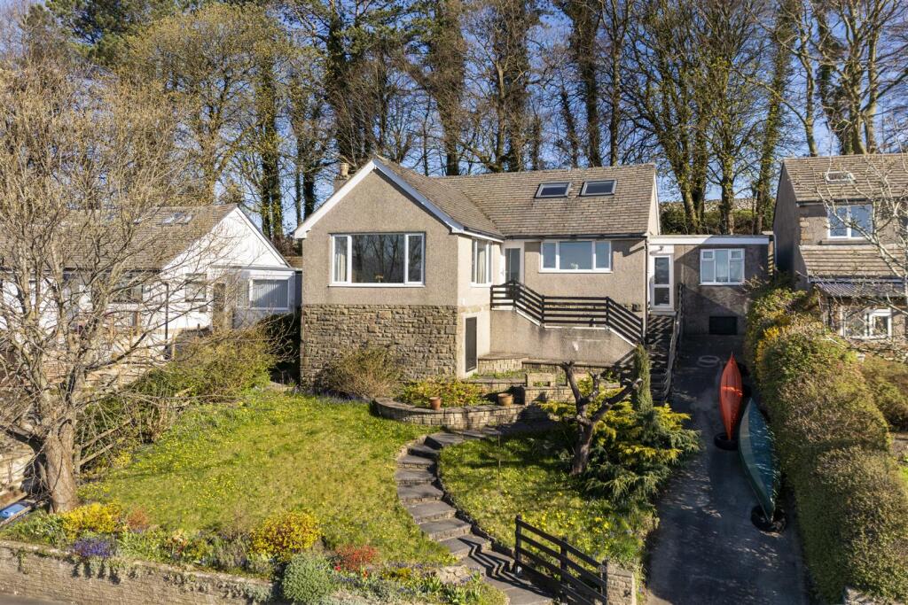 Main image of property: 14 Ingleborough Park Drive, Ingleton