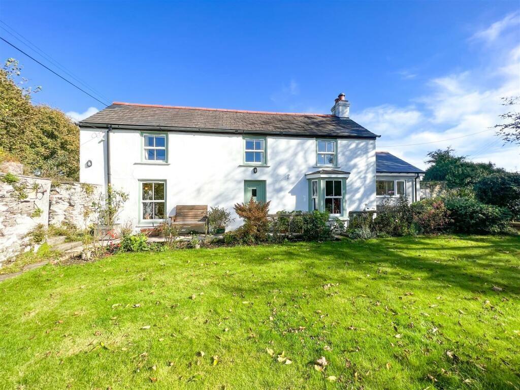 Main image of property: GORGEOUS DETACHED COTTAGE