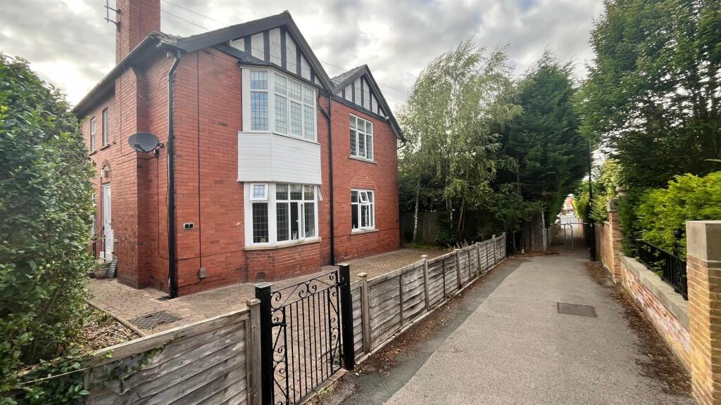 Main image of property: Woodside Walk, Harrogate