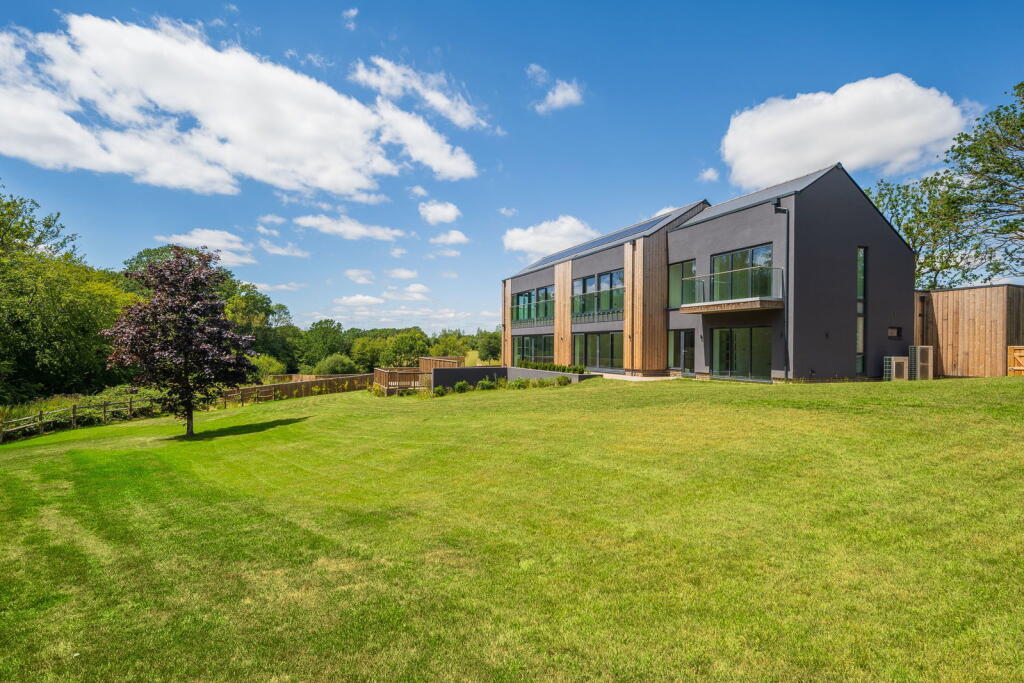 Main image of property: Honeysuckle House - Beechwood Drive, Tenterden, Kent TN30 6HX