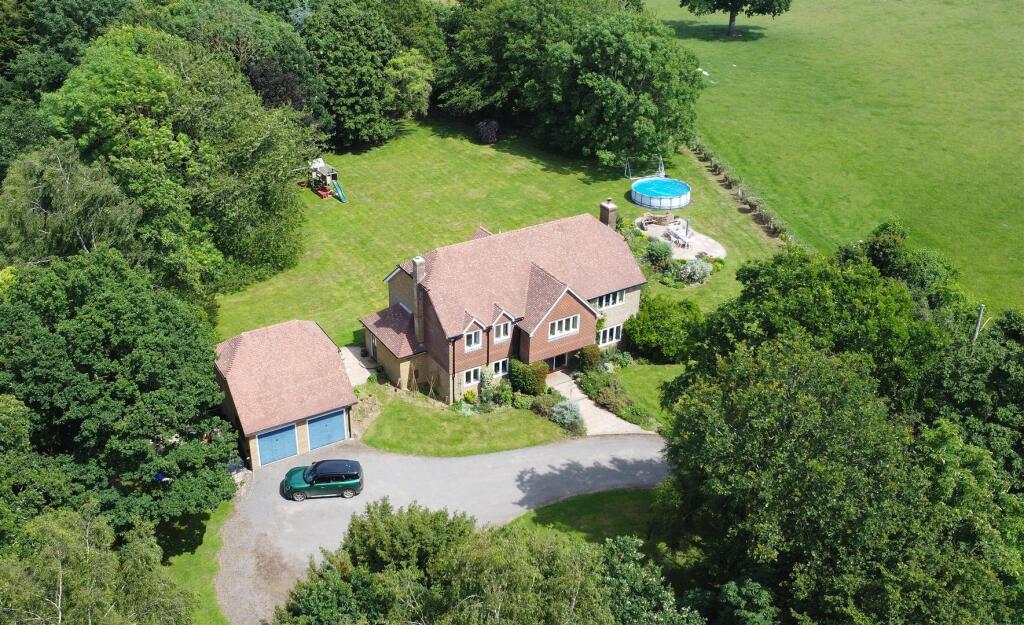 Main image of property: Woodchurch