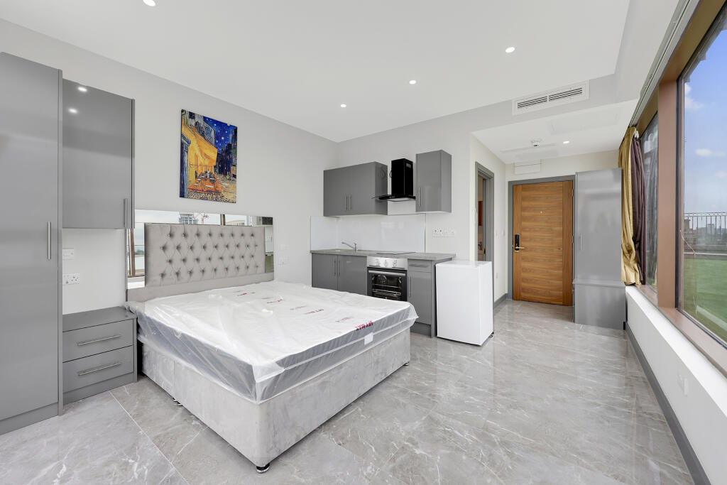 Main image of property: Godino Apart-Hotel Studio Apartments 48 Cranbrook Road Ilford IG1 4NF