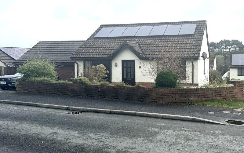 Main image of property: Two bedroom detached bungalow with gas central heating, parking, garage and garden 