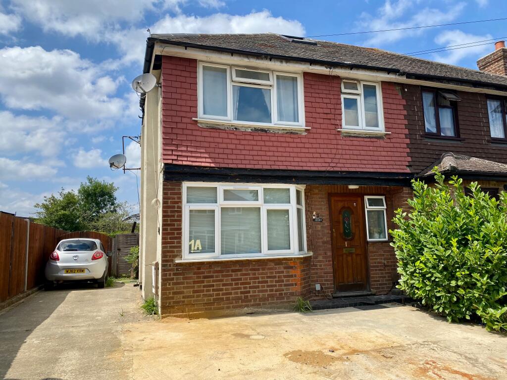 Main image of property: OLD WOKING