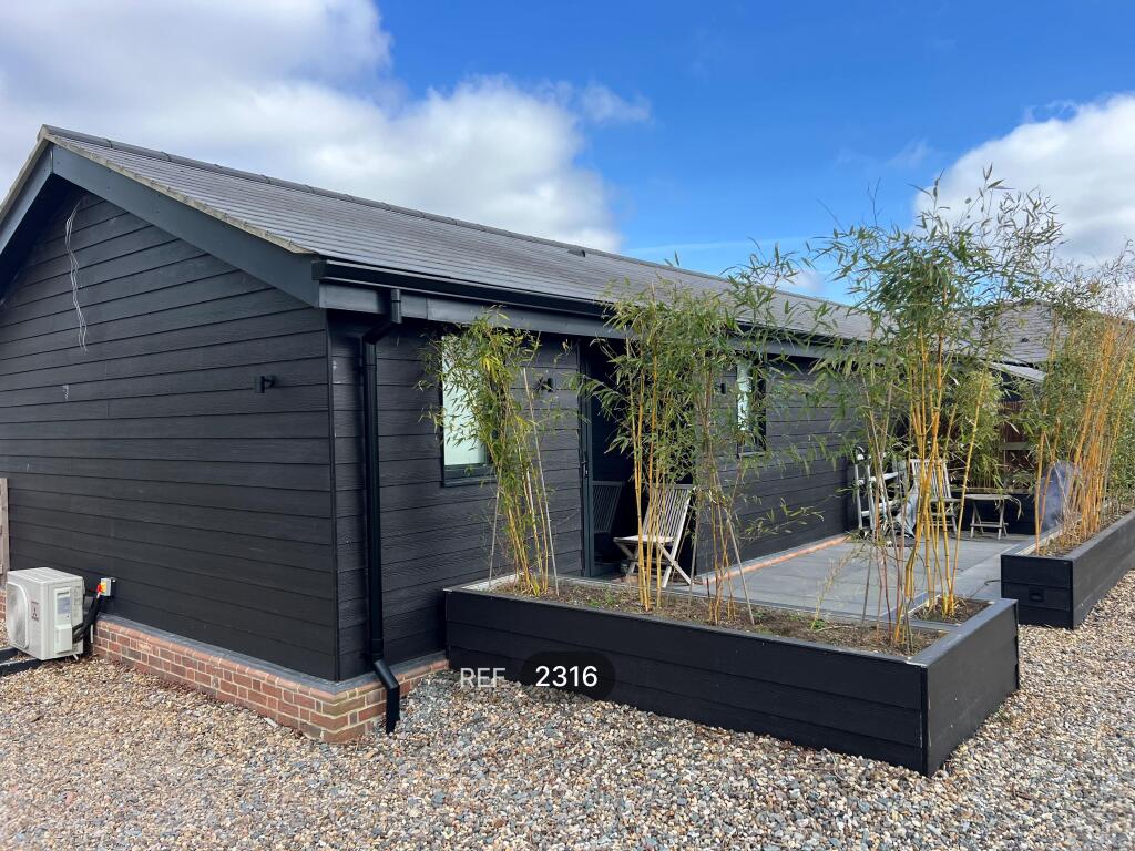 Main image of property: Poplar Cottage, Woodbridge road, Boulge, Woodbridge, IP13 6BT