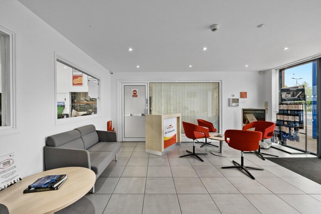 Photo 3. Reception area - unit 1.