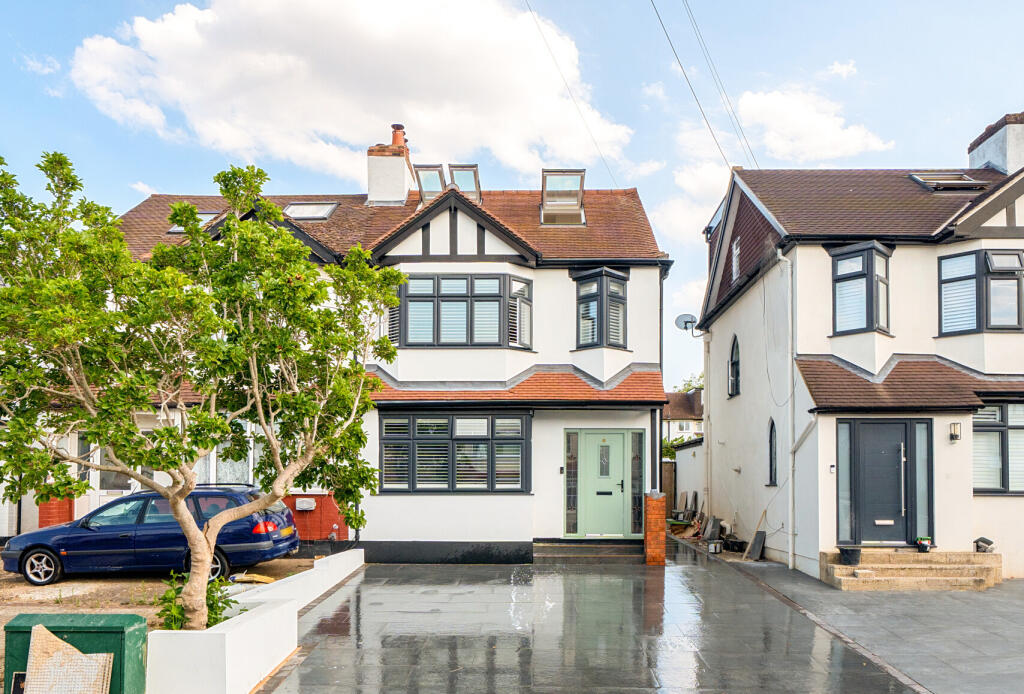 Main image of property: Carlingford Road, Morden, SM4