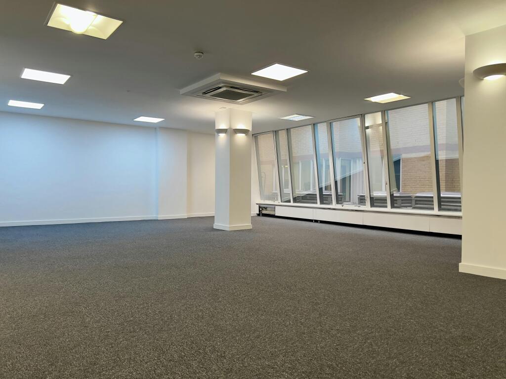30-31 Furnival 1st Floor Spacious Carpeted Office Area With Large Windows.jpg