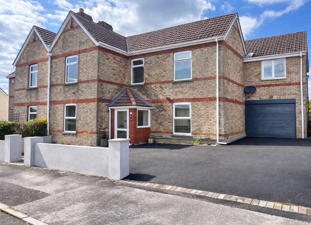 Main image of property: Lacey Crescent, Poole
