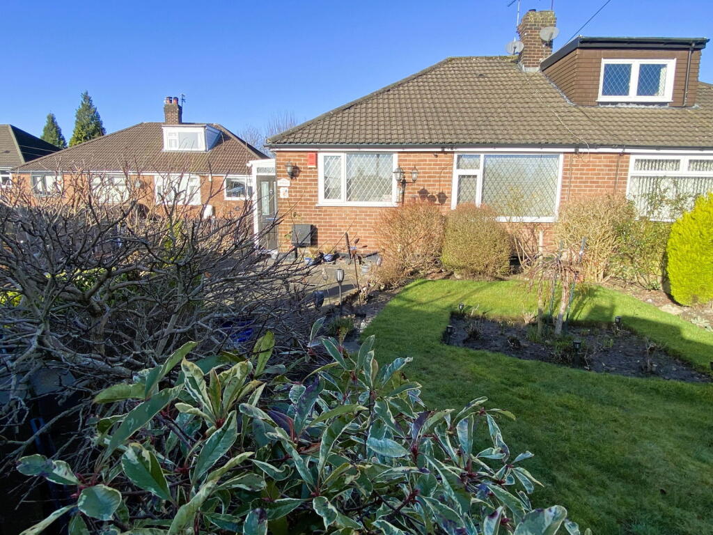 Main image of property: 12 Teasdale Close, Chadderton OL9 8AS