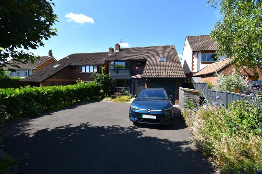 Main image of property: Stylish detached home on Grove Road, Coombe Dingle moments from Blaise Estate