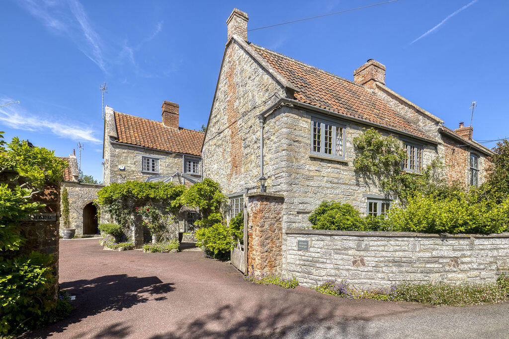 Main image of property: Elegant Grade II Home with Charming Cottages in Stawell, Somerset