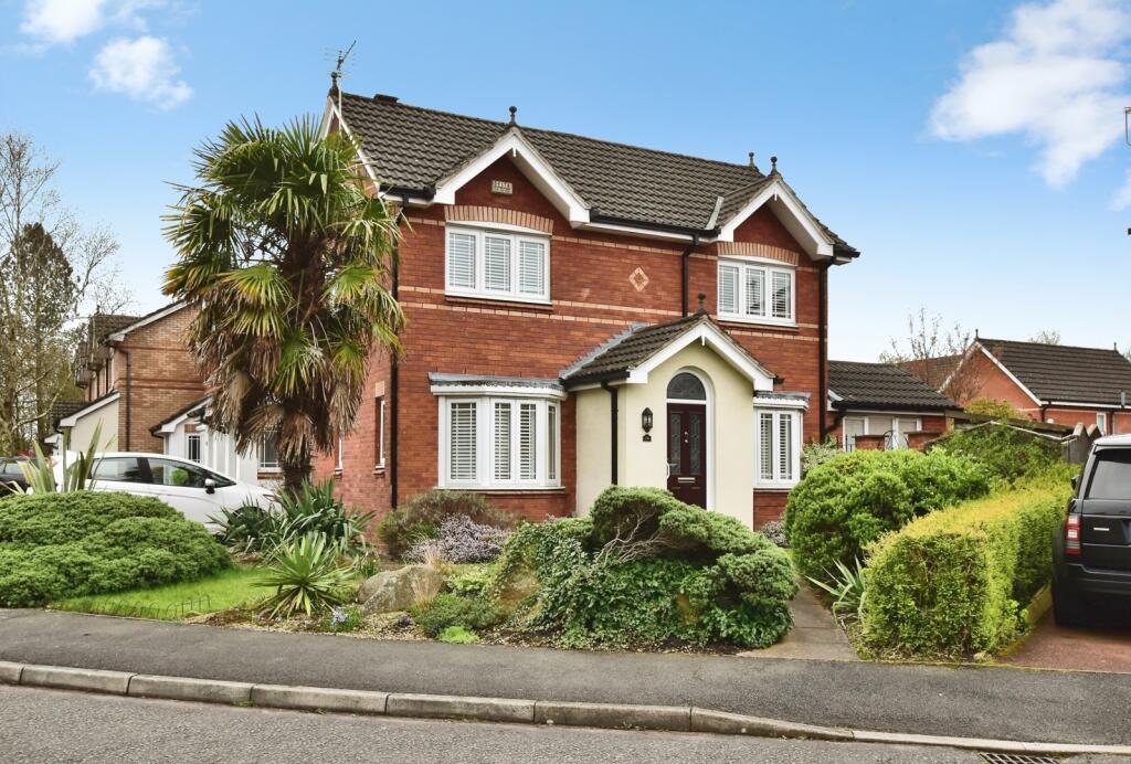 Main image of property: Holmeswood Close, Wilmslow, Cheshire, SK9