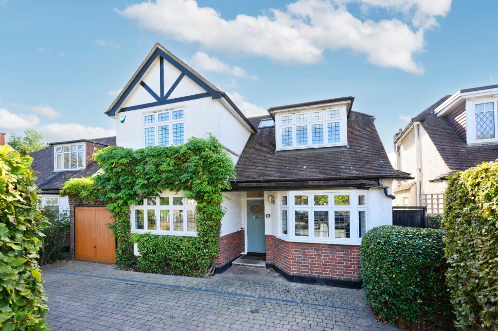 Main image of property: Garrick Close, Hersham, Walton-on-Thames, Surrey, KT12