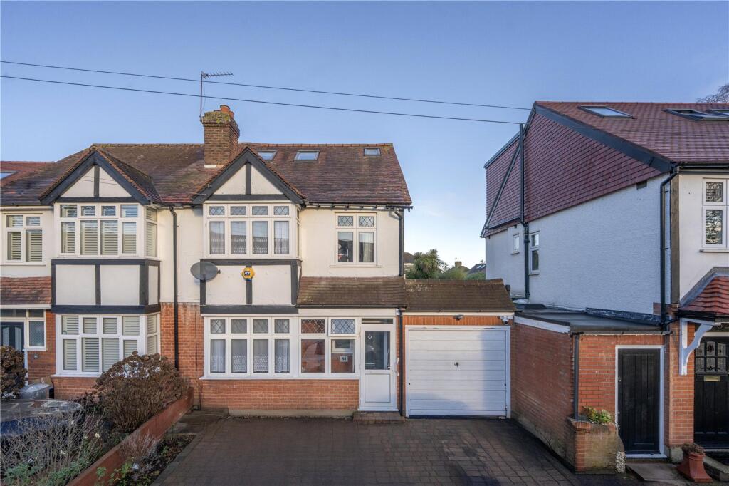 Main image of property: Holly Bush Lane, Hampton, TW12