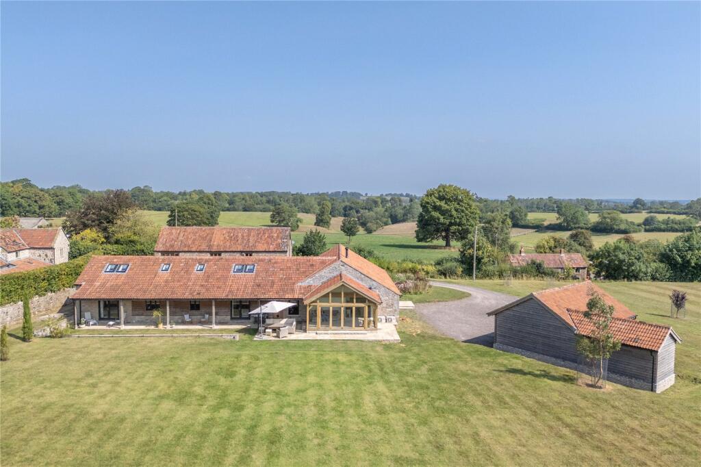 Main image of property: A Substantial Country Residence - Two Large Barn Conversions, Outbuildings & 14 Acres of Land approx.