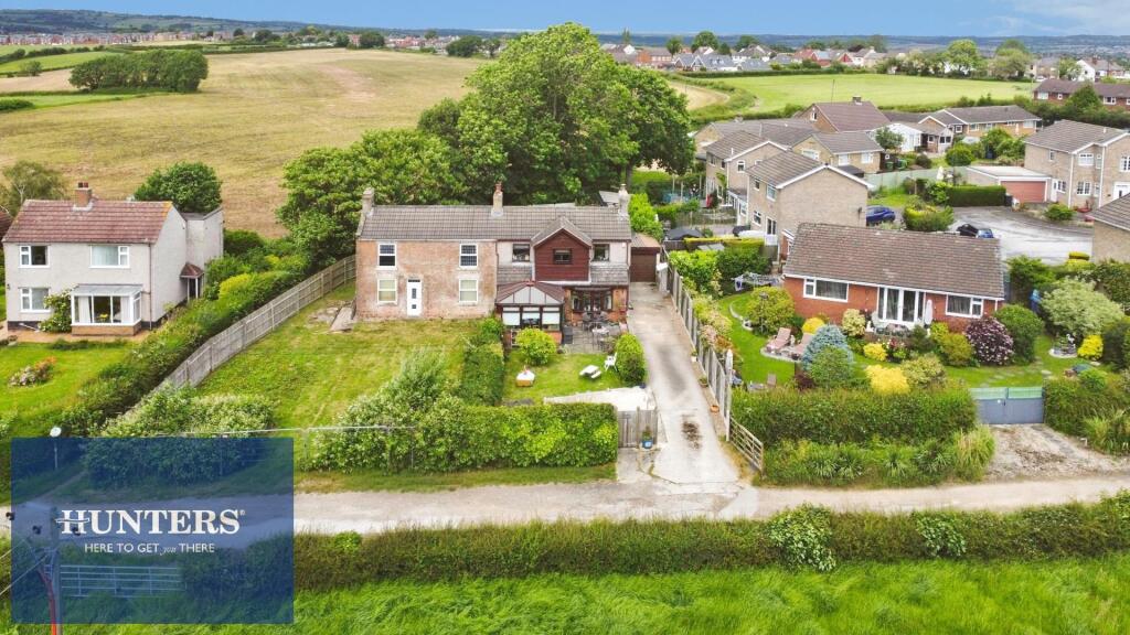 Main image of property: Dumble Cottage - Grove Road, Brimington Common, Chesterfield, S43 1QJ
