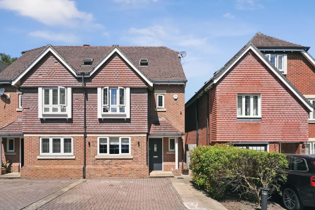 Main image of property: Poplar Close, Epsom, KT17