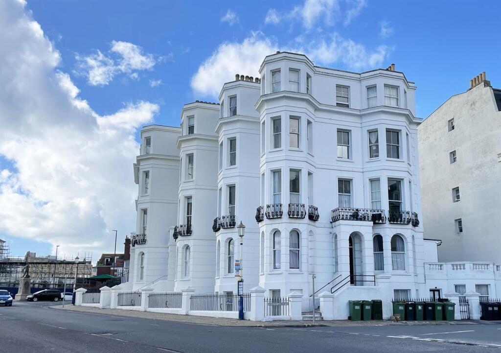 Main image of property: Queens Mansions, 1a Queens Gardens, Seafront, Eastbourne