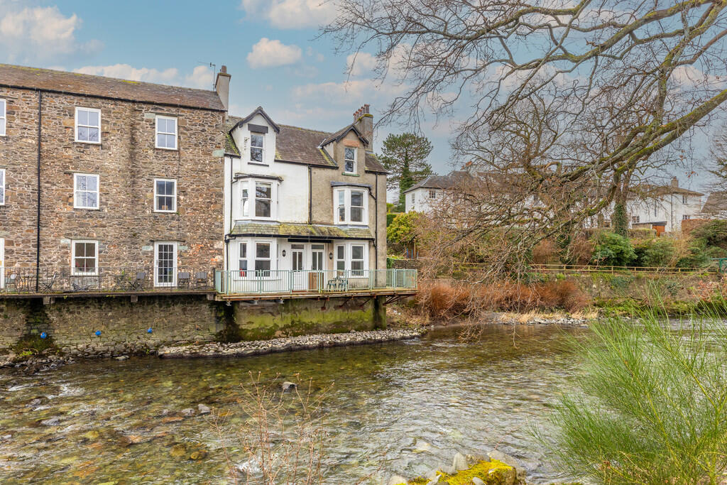 Main image of property: Riverside Cottage, 9 Greta Side, Keswick, Cumbria, CA12 5LG