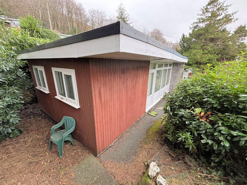 Main image of property: Chalet 36 Woodlands Holiday Park, Bryncrug, Gwynedd, LL36 9UH
