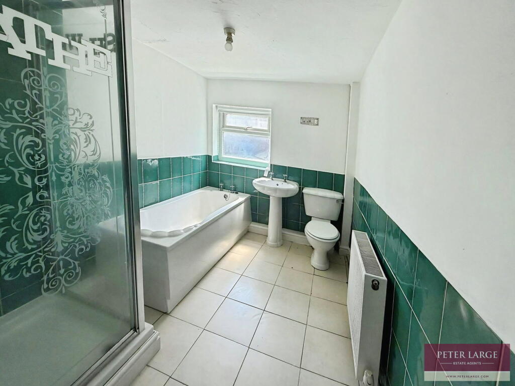 House in Rhyl - More