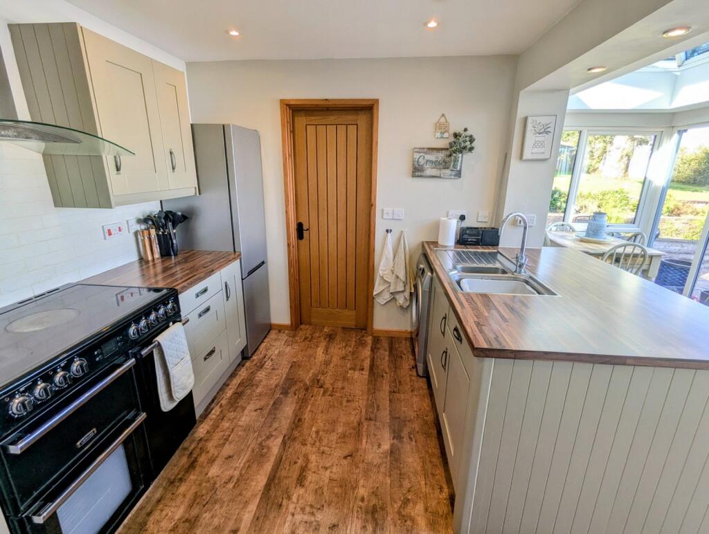 House in Swansea - More