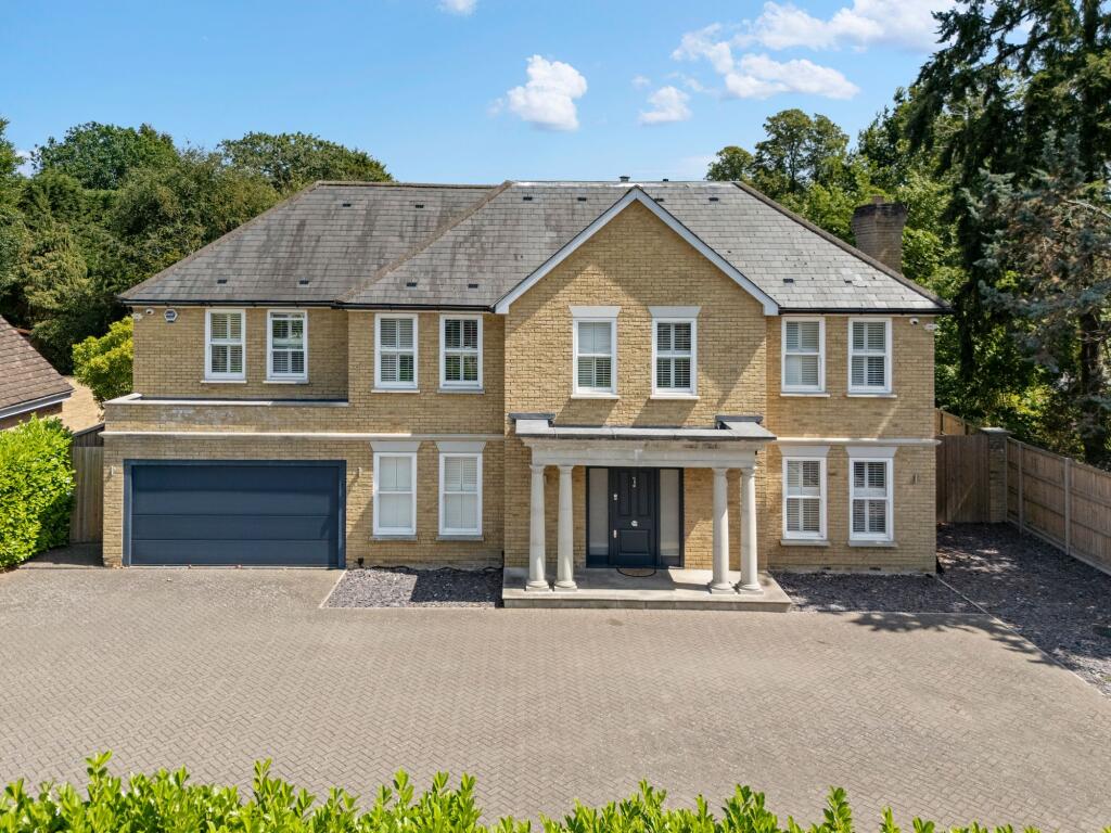 Main image of property: Woodend Park, Cobham, KT11 3BX