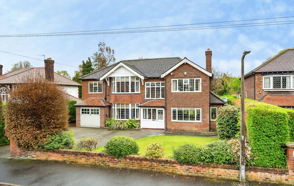 Main image of property: St Michaels Avenue, Bramhall, SK7 - 4/5 Bedroom Detached Family Home