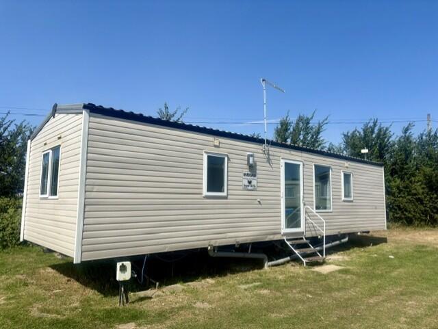 Main image of property: Coopers Beach Holiday Park, Church Lane East Mersea, Colchester, Essex, CO5 8TN