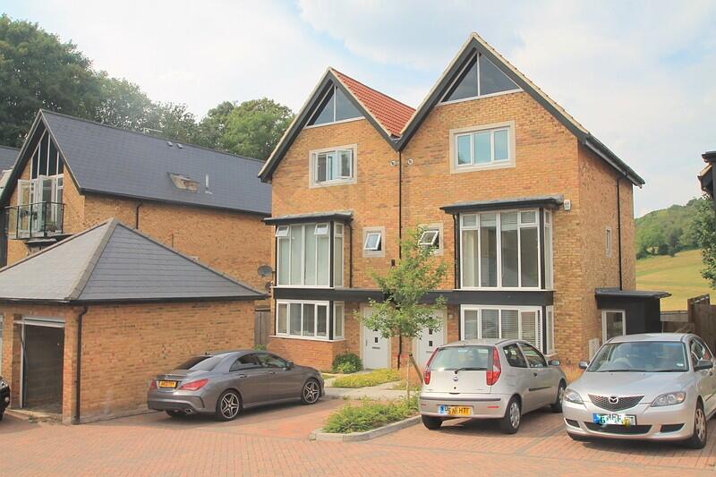 Main image of property: 4 bedroom Semi Detached House in Warlingham