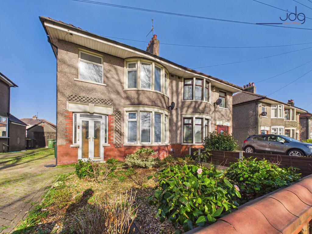 Main image of property: Torrisholme Road | A park-facing home with great potential throughout
