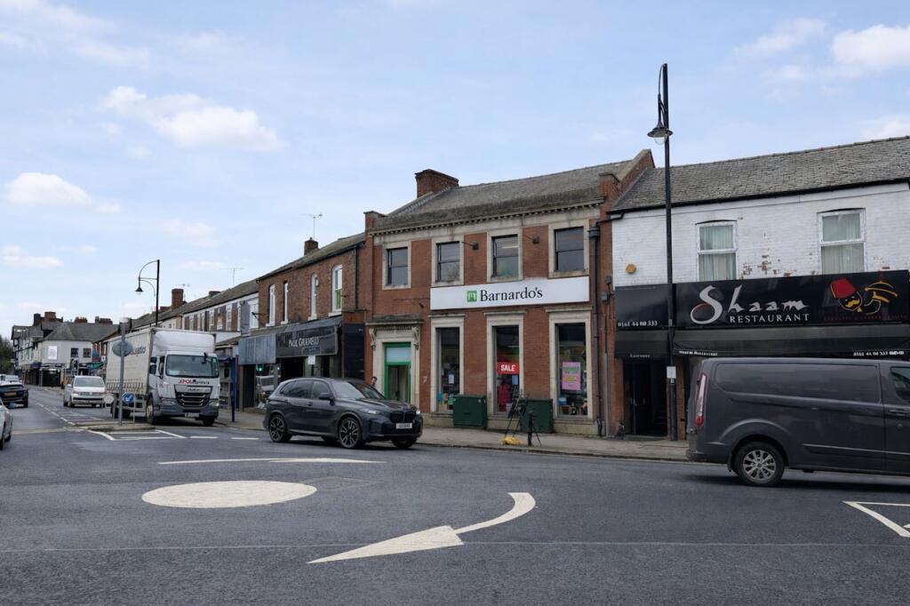 Main image of property: 2 Bramhall Lane South, Bramhall, Stockport, SK7 1AF