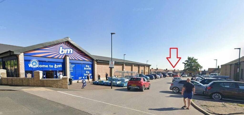 Hoyalnd retail street view with red arrow.jpg
