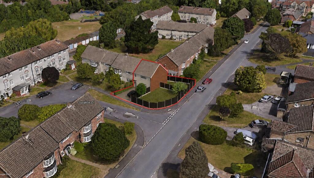 Main image of property: Land Adjacent To 10-13 Swallow Close, Bushey, Hertfordshire, WD23 1AS