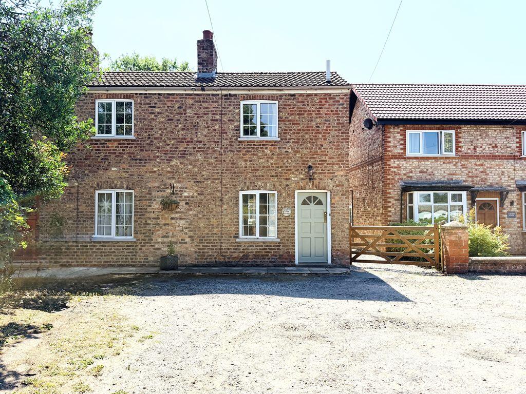 Main image of property: Post Office Cottage, Hatkill Lane, Full Sutton, York YO41 1HW