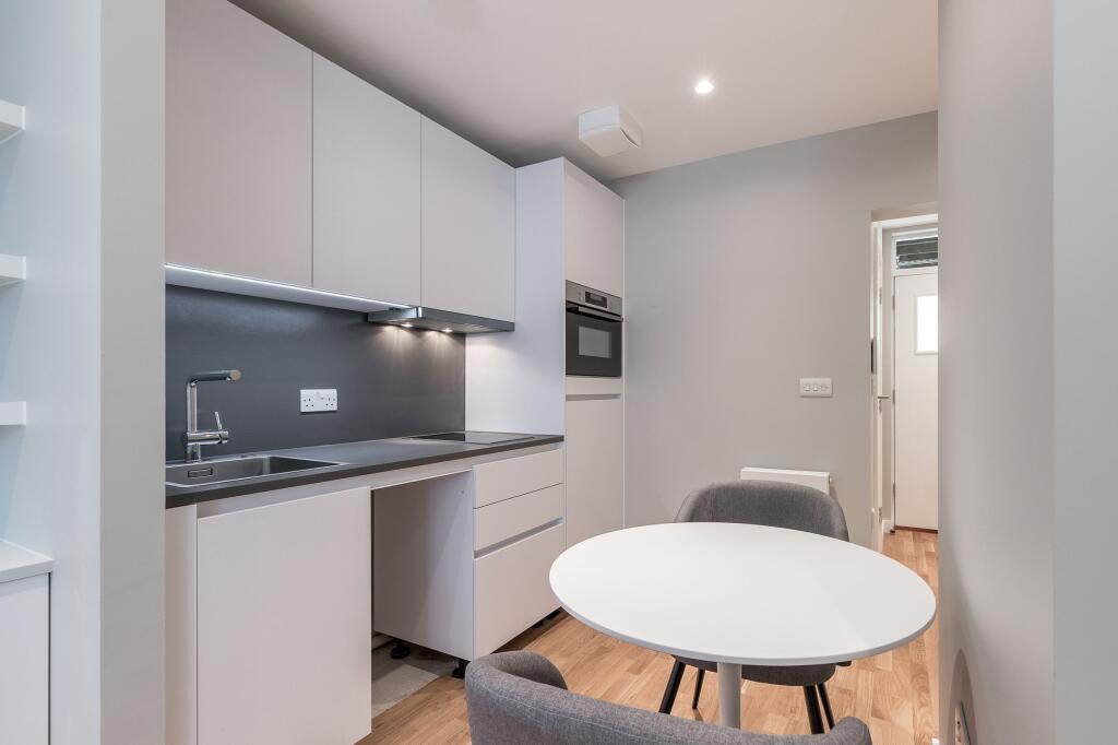 Main image of property: Flat 1 Riverside Apartment