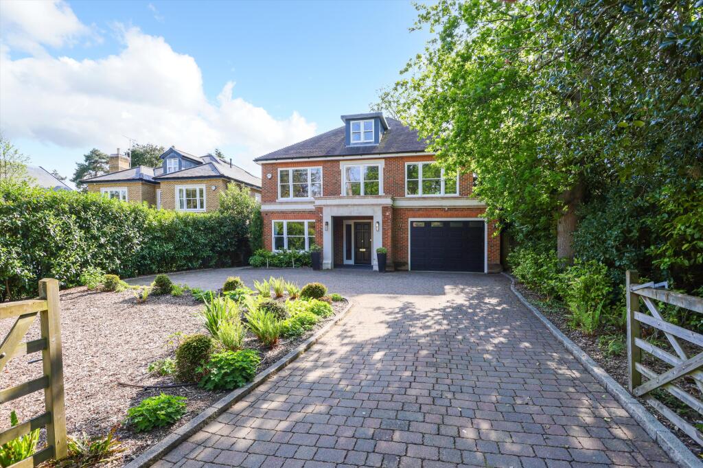 Main image of property: Woodside Road, Cobham, Surrey, KT11